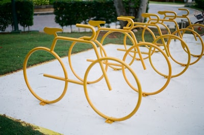 White concrete on the floor of the yellow metal frame
